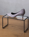 Shoe and accessory display riser with black leather finish